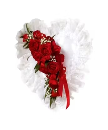Red rose bouquet with white tulle and a red ribbon