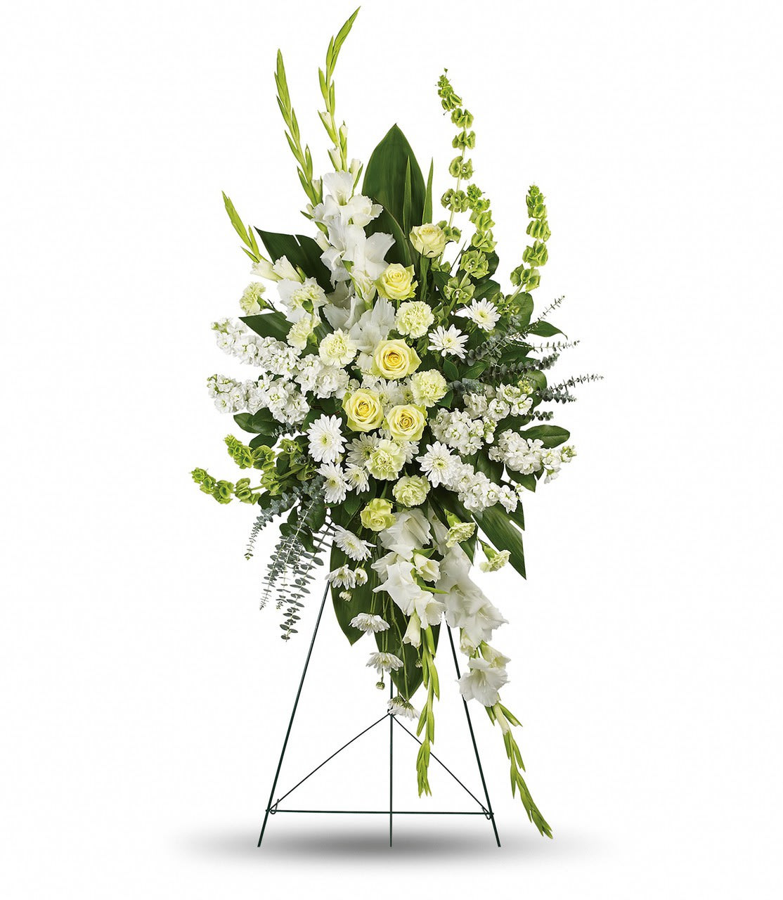 Tall white and pale yellow funeral spray on a stand