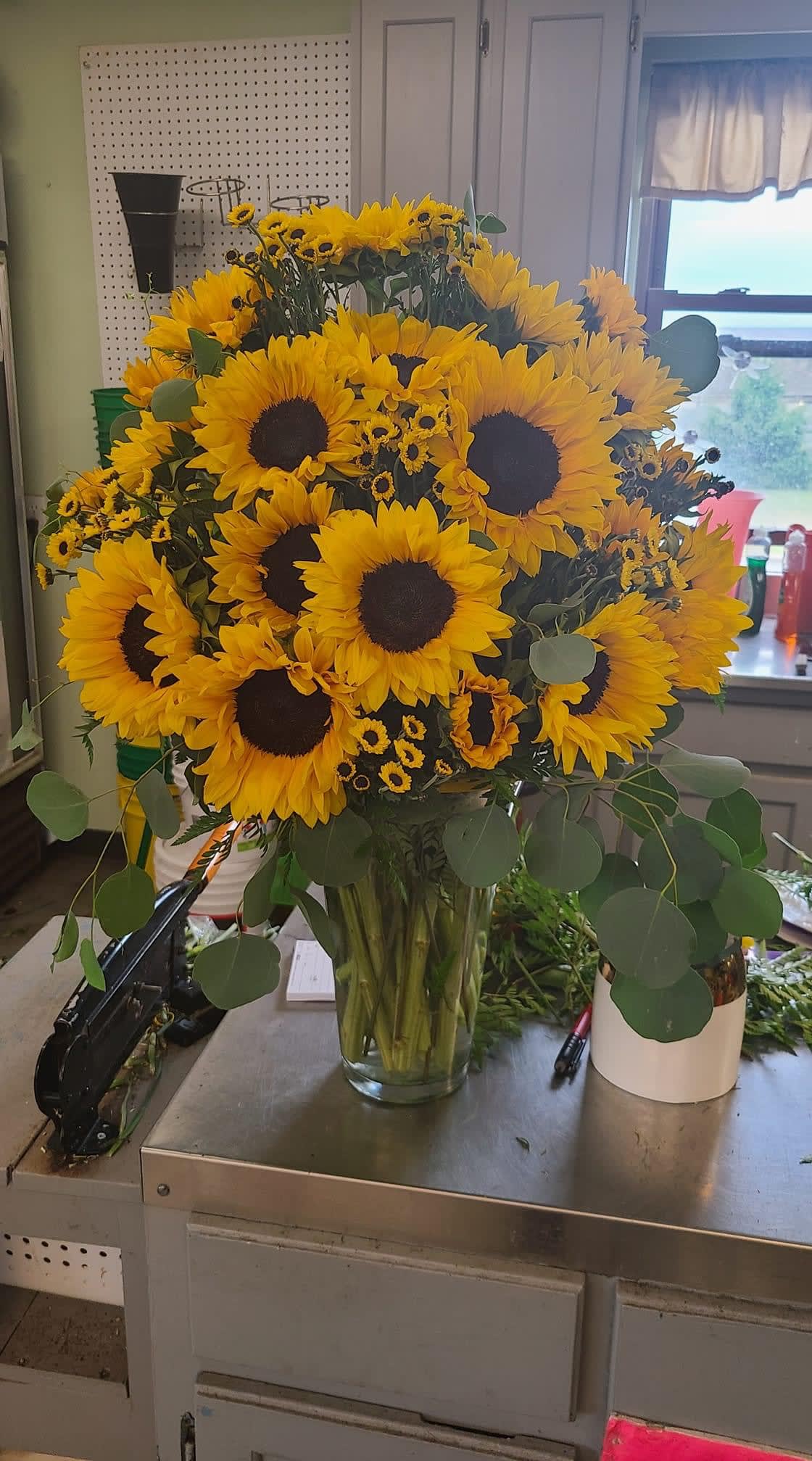 You Are My Sunshine  - Love sunflowers? Do they? Who doesn’t, right? Brighten up someone’s day for sure with this beautifully designed huge sunflower arrangement. Please note filler flowers may differ due to seasonal changes. (Picture shown is of Premium Option)