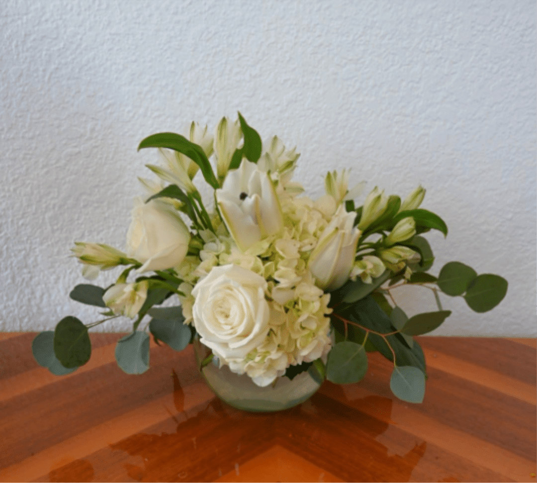 Enduring Elegance - This calming arrangement of hydrangea, roses, alstroemeria is accented with eucalyptus to create an elegant and peaceful display. Enduring Elegance is perfect for sympathy gestures or simply offering a gesture of support.