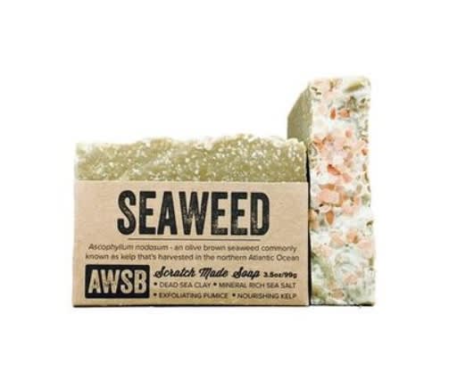 Seaweed-scented handmade bar soap with kraft paper label and exfoliating texture