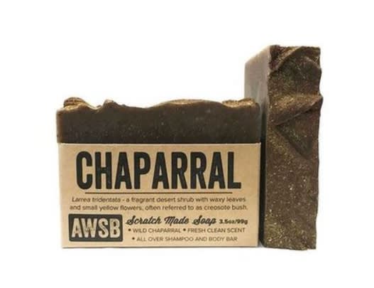 Two brown rectangular bars of chaparral scratch-made soap with kraft paper label