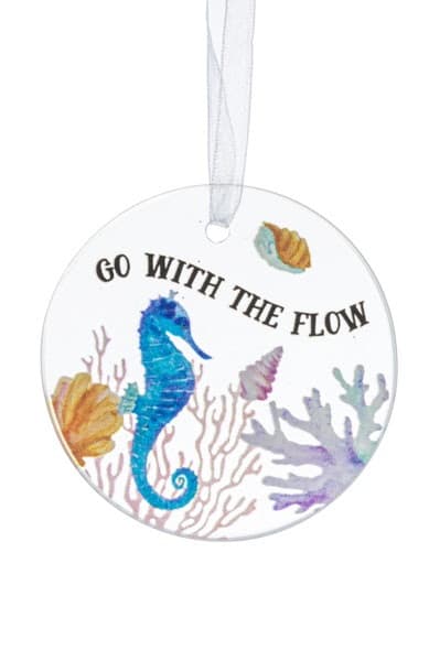Round hanging ornament with a seahorse and the words Go With The Flow