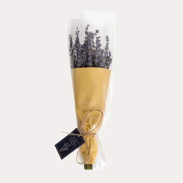 Dried Lavender Mini Bouque - This hand harvested bouquet of blue-purple flowers provides a calming element of organic texture wherever it's placed. Stand the lavender in a vase, tuck it into a basket, or hang it in a window. 