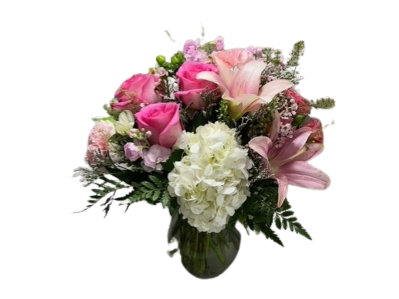 Pink roses and lilies with white hydrangea in a glass vase