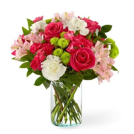 Sweet and Pretty Bouquet - The true beauty of this bouquet is within the sweet colors of the flowers. An array of hot pink roses, pale pink alstroemeria and more are set in a glass cylinder vase, making a wonderful gift to light up the face of its recipient.  Please Note: The bouquet pictured reflects our original design for this product. While we always try to follow the color palette, we may replace stems to deliver the freshest bouquet possible, and we may sometimes need to use a different vase. 