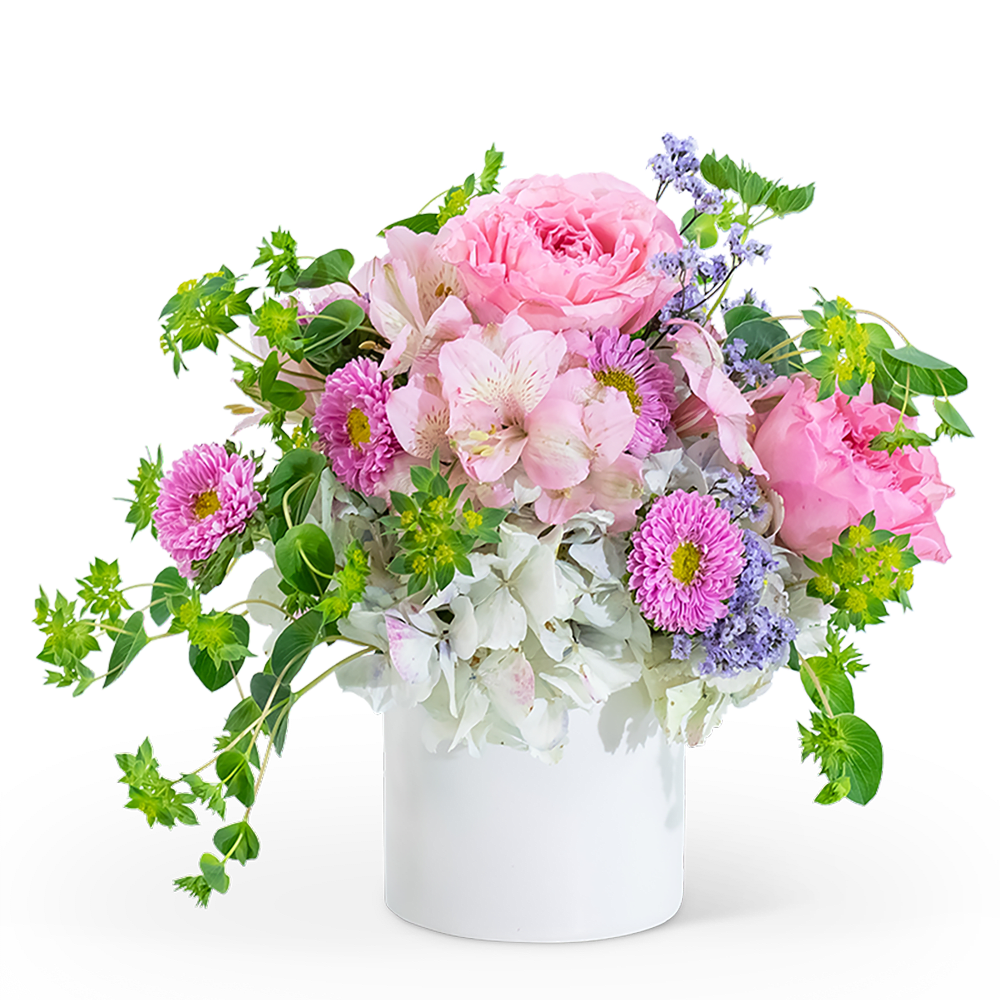 Pink and white mixed bouquet in a white vase