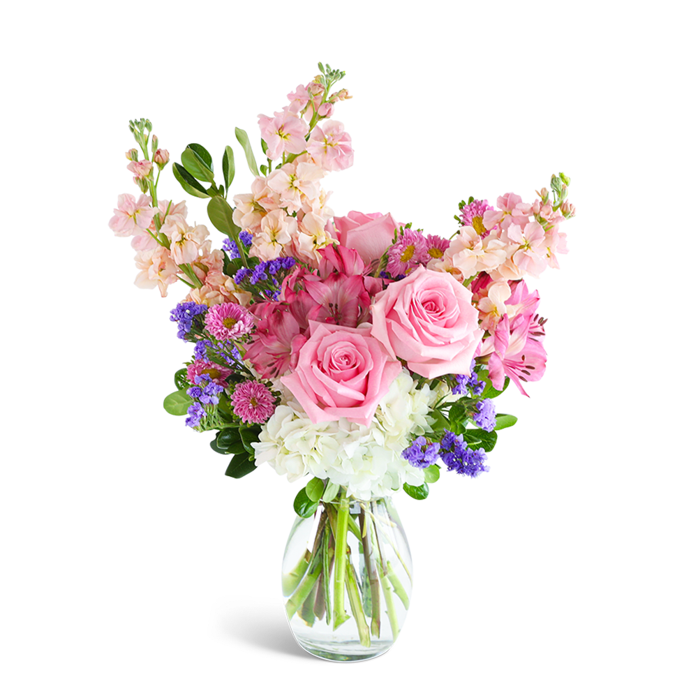 Sweet Bunch of Love - "Spread love and joy with our exquisite Sweet Bunch of Love Bouquet. Delicate pink roses, Alstroemeria, and Hydrangea are artfully arranged in a clear glass vase, creating a beautiful and tender look that is sure to bring a smile to anyone's face. With its pop of pastel colors, this unique flower arrangement is perfect for adding a touch of soft elegance to any occasion.   Our floral inventory changes with the seasons and market availability. These images are indicative of our general size &amp; style. We can offer same-day flower delivery in most cases. If you are sending the bouquet directly to your recipient, please provide the complete address and contact information so that we can deliver the flowers directly to them."
