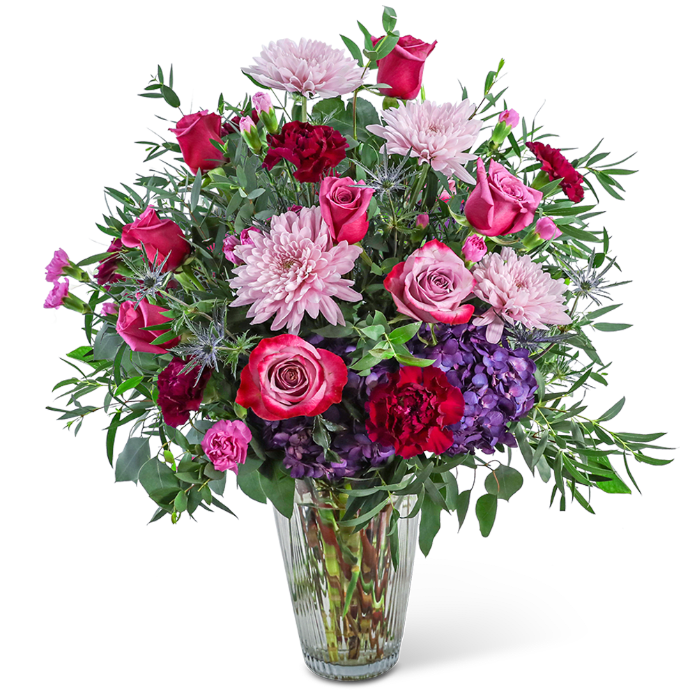 Magenta Dreamscape - Delight in the rich magenta tones of one of our floral favorites, Magenta Dreamscape. A tall, chic vase with hydrangea, roses, carnations, and premium foliage makes up this beautiful floral design. This vibrant flower arrangement will brighten anyone's day and add a pop of color to any space. It would make a perfect Anniversary or Birthday gift for that special someone, adding a touch of elegance and charm to their celebration.