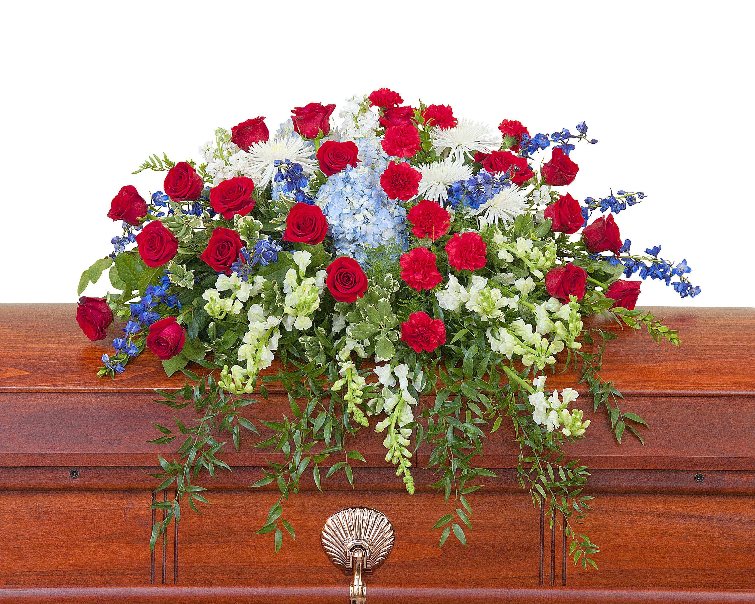 Honor Casket Spray - This beautiful red, white and blue casket spray gives tribute to the one who served with honor.	Approximately 44" wide 36" deep