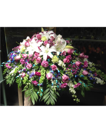Large floral spray with white lilies and pink roses