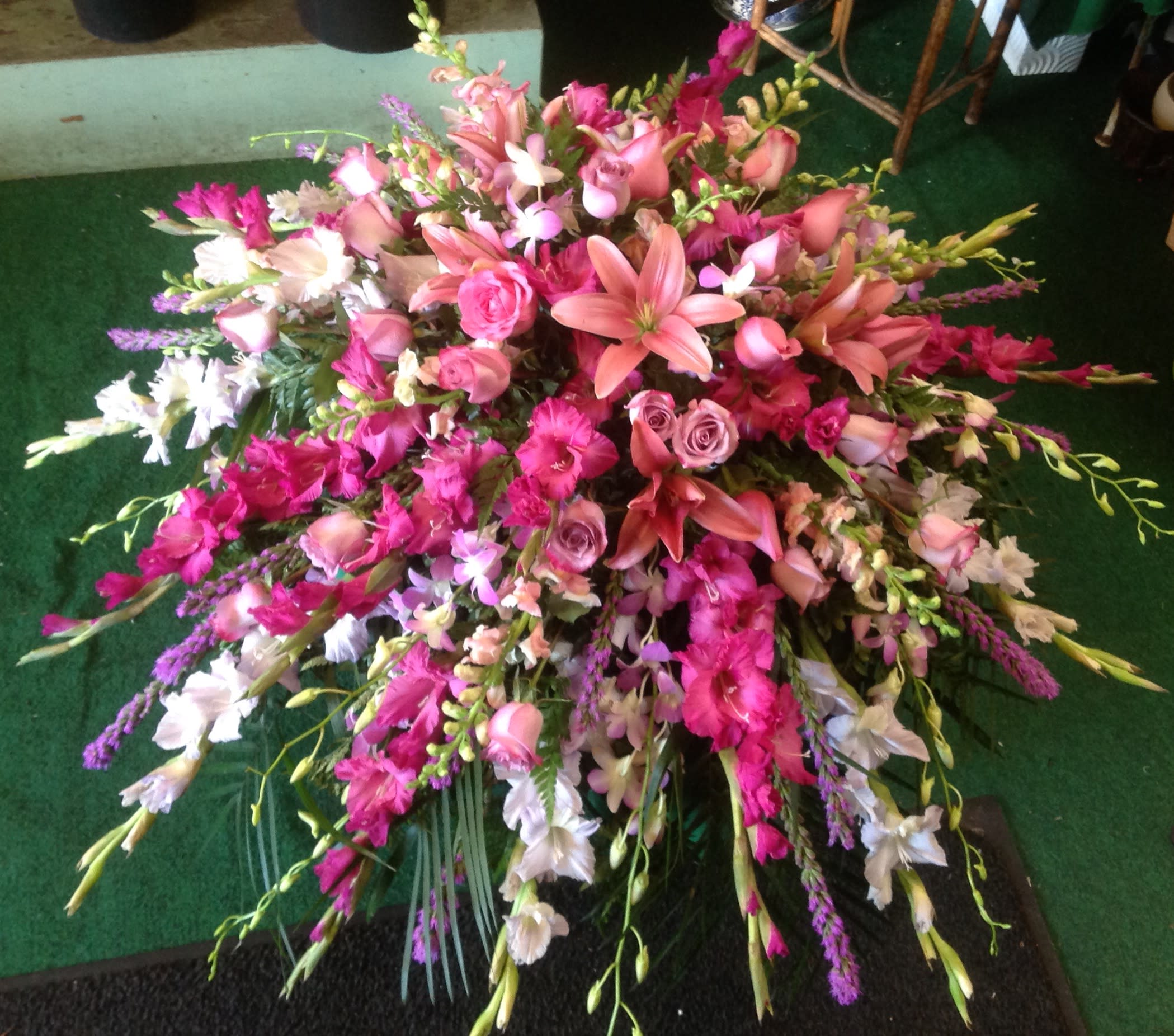 Large pink and white floral spray with lilies and roses