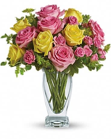 Teleflora's Glorious Day - Some people like their lemonade yellow, while others prefer pink. Guess what? This glorious arrangement caters to both! Pretty pink and lemon yellow blossoms are served up gloriously in a Couture Vase. Yellow and light pink roses, pink spray roses and fresh greenery are delivered in a stylish vase.
