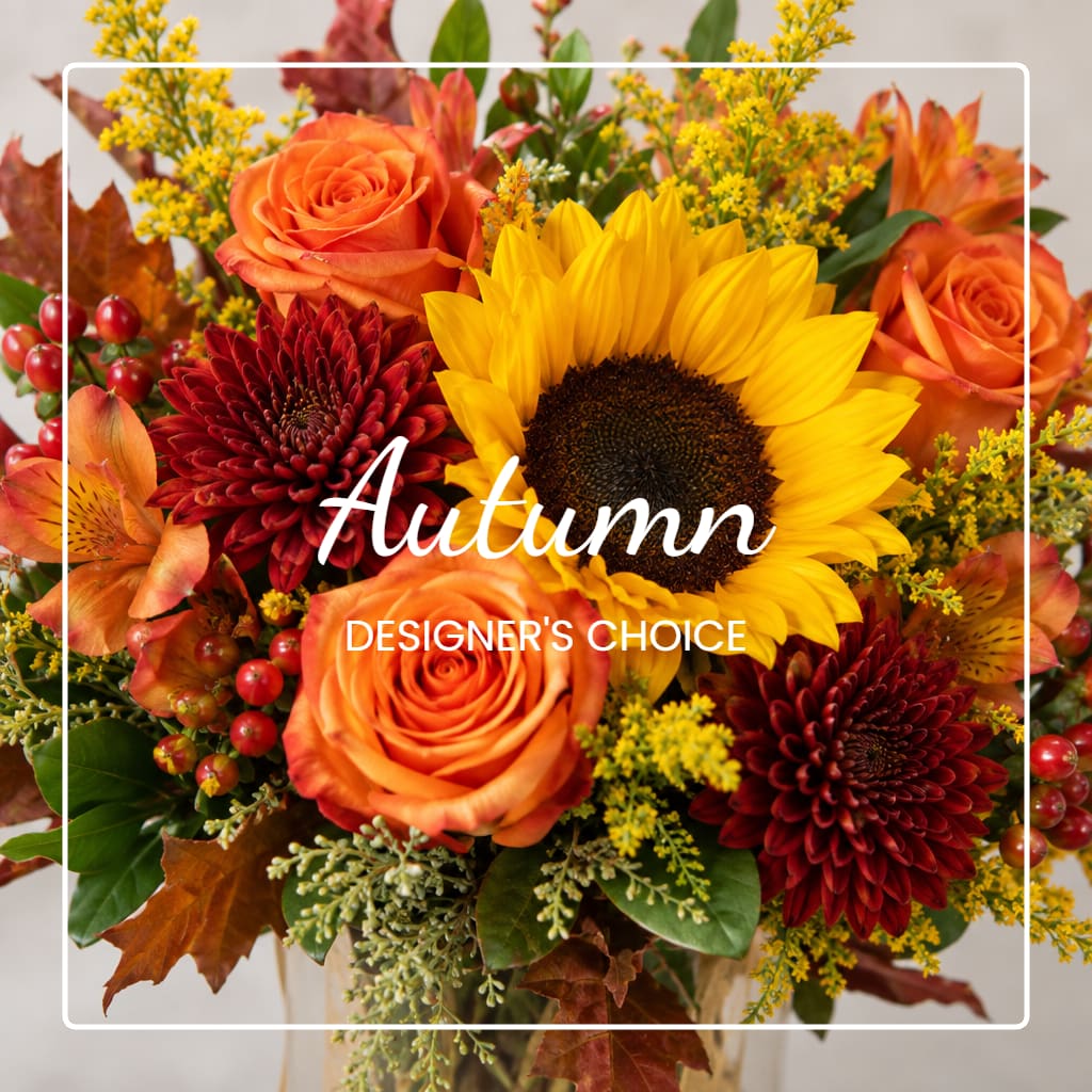 Autumn bouquet with sunflowers, orange roses, and burgundy mums
