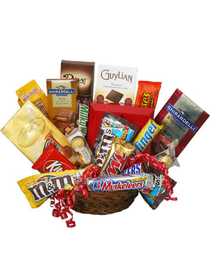 Basket of assorted candy bars and chocolates with red ribbon