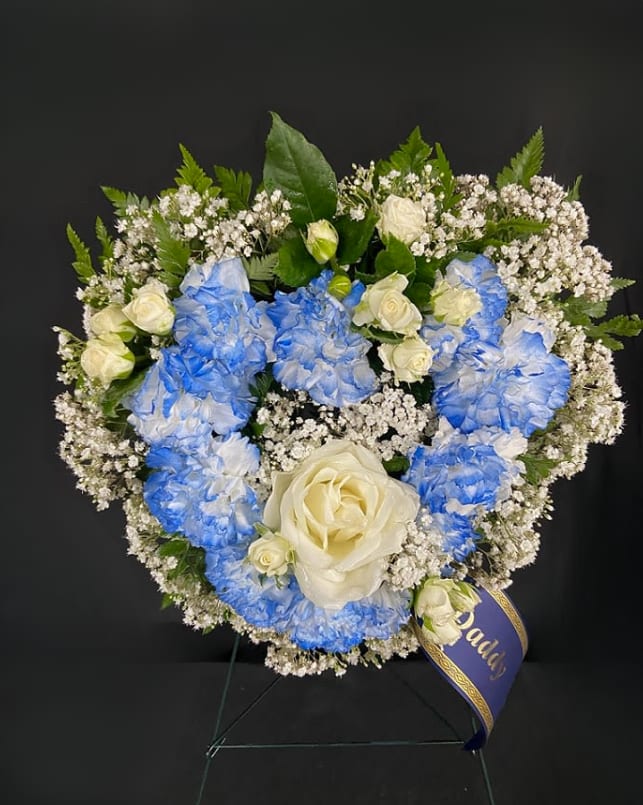 Blue and white floral wreath with roses and baby's breath