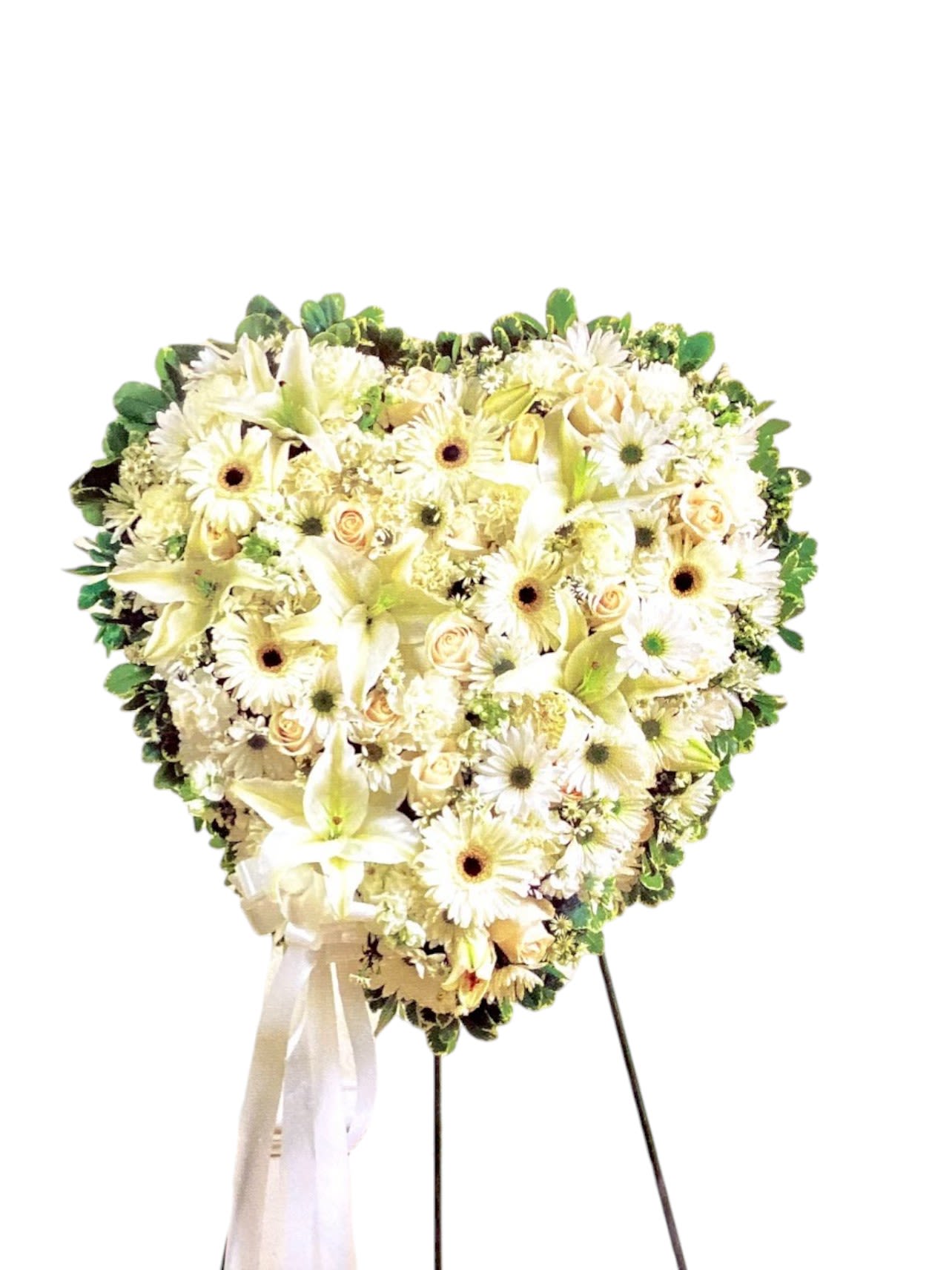 Heart-shaped white floral standing spray with ribbon