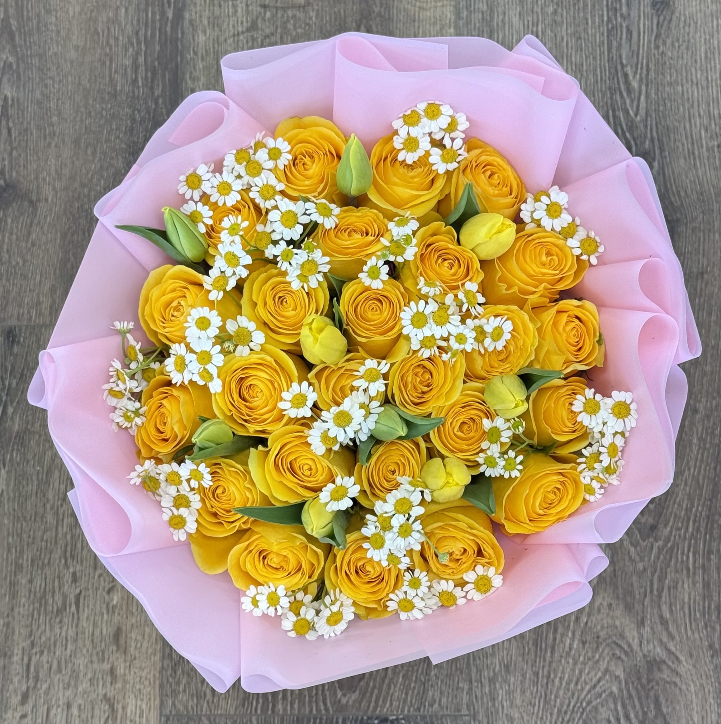 Yellow Rose ,tulip, and chamomile Bouquet - 25 Yellow roses mixed with Yellow tulips, and white chamomile. Flowers are wrapped in pink Korean paper. (In-Store)