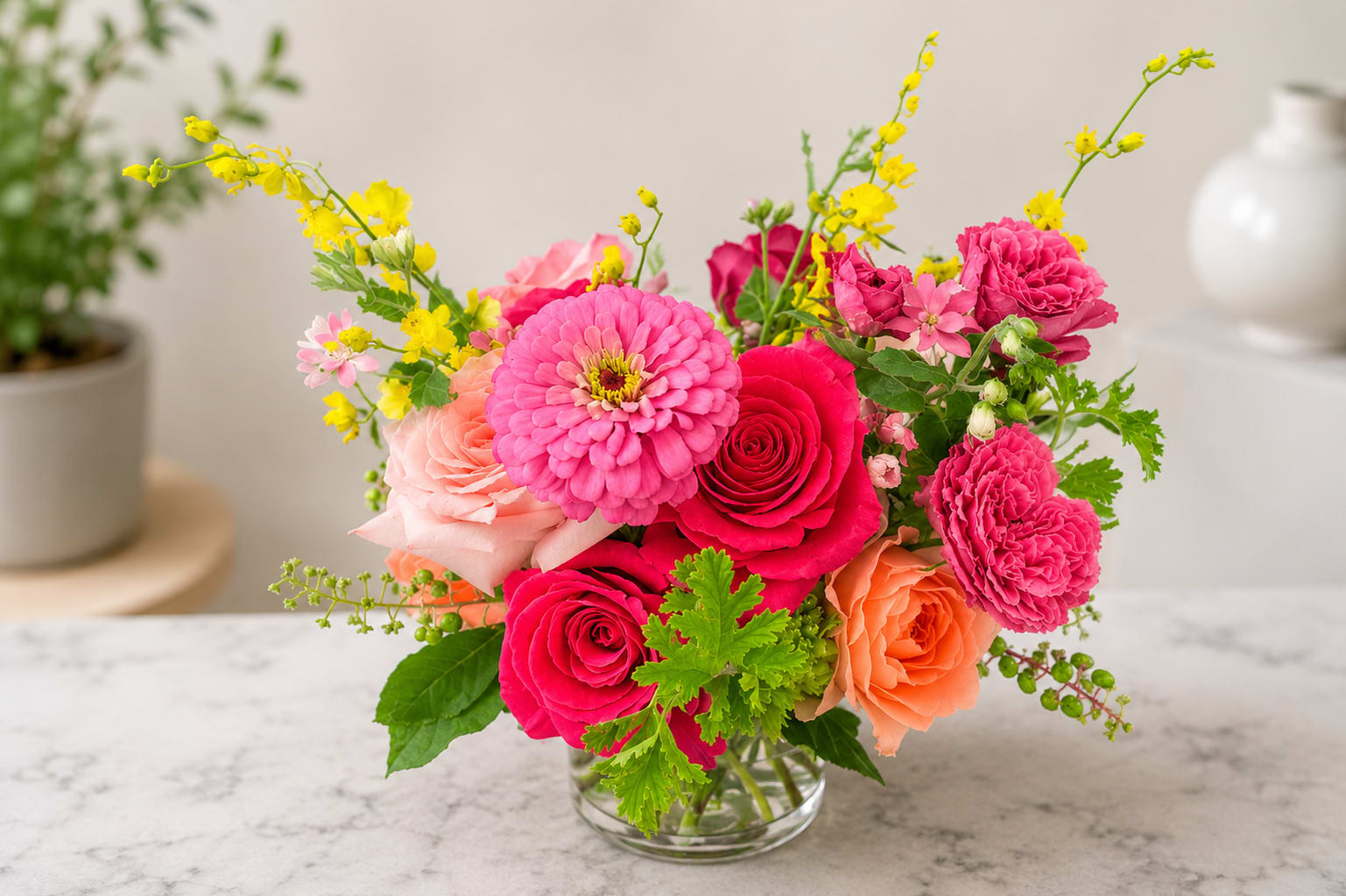 Pink Lemonade - Our floral artisans thoughtfully design each arrangement using premium seasonal blooms and locally sourced botanicals whenever possible. Due to availability, substitutions may occur, but we will always preserve the color palette, style, and overall beauty of the design using flowers and vessels of equal or greater value. Every arrangement is uniquely created, ensuring a one-of-a-kind floral experience.