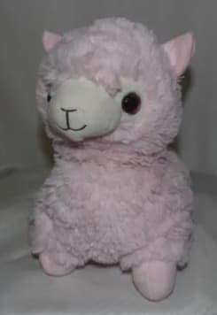 Pink plush llama stuffed animal with a white face and black eyes