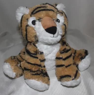 Plush tiger stuffed animal with orange and black stripes