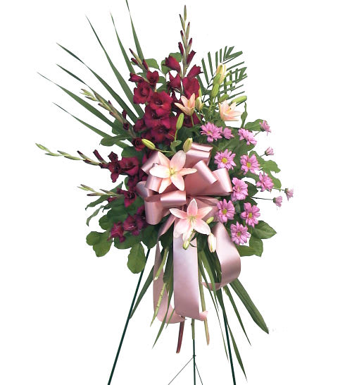  Thoughtful standing funeral spray  - Thoughtful standing funeral spray with fan-shaped groupings of foliage, daisies and gladioi. This funeral gift also includes lilies and large matching bow. A heartfelt tribute in memory of a loved one.