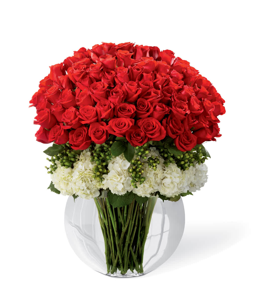 Lavish   Luxury Bouquet - Lavish your special someone with a bouquet that will leave them breathless. 100  premium long-stemmed roses offer a message of passionate love and affection arranged amongst a bed of white hydrangea blooms ..this arrangement an exceptional choice for proposals, milestone anniversaries, Valentine’s Day, or moments when love deserves to be expressed in grand style.