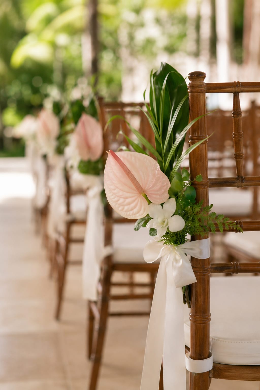 2 count Chair Adornments for Aisle Way - Floral chair adornments add an intentional layer of beauty to the ceremony or event space, transforming simple seating into part of the overall design story. These accents help frame the aisle, highlight key guest or couple seating, and create a more elevated atmosphere without overwhelming the space. 