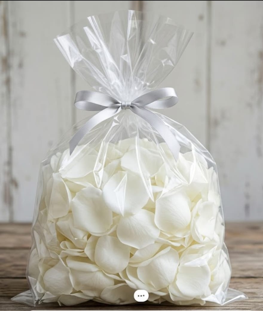 Petals/Flowers - Flower petals add a romantic, polished finishing touch to an aisleway, entrance, or ceremonial moment, creating a soft pop of color and texture that enhances the overall atmosphere with a softness that feels intentional and photo-ready.