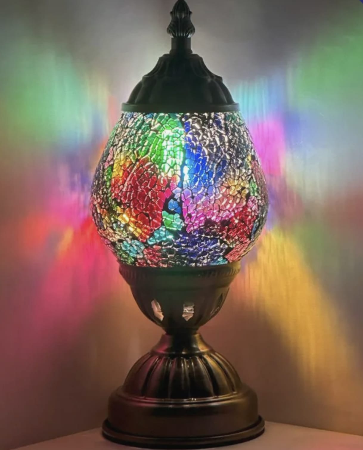 Colorful mosaic table lamp with a dark metal base