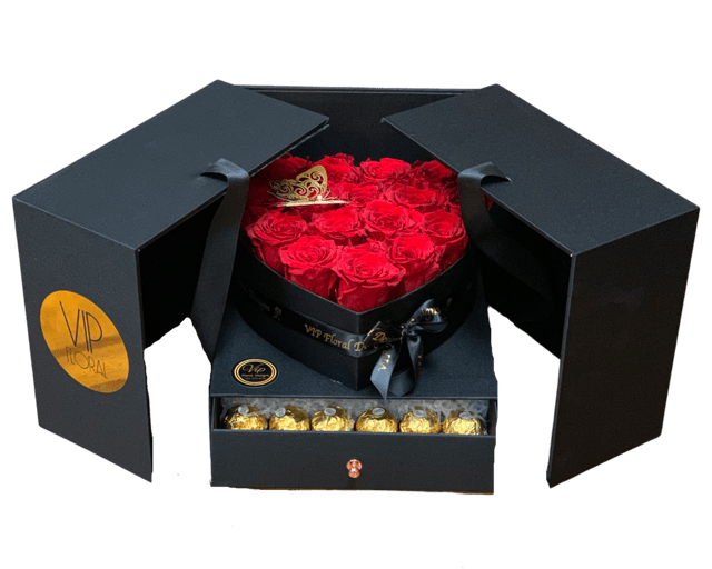 "Seduce" Flower Heart Box (preserved roses) - Beautiful presentation flower box with 15-16 long-lasting red roses and Ferrero Rocher Chocolate. The preserved roses will last up to 3 years without water. NO WATER EVER! 