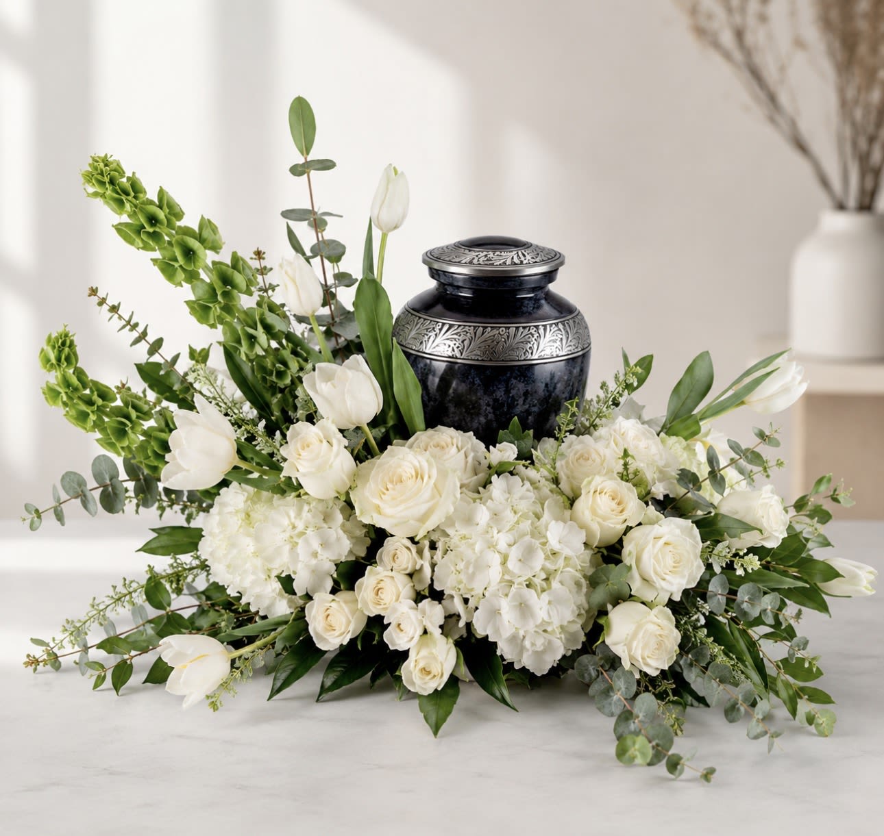 Cremation Wreath/WHITE - Every arrangement is handcrafted just for you. We carefully select the freshest flowers available each day. Occasionally, substitutions may be necessary due to seasonal or market availability, but we always replace them with flowers of equal or greater value in the same color palette and style. Your arrangement will always be beautiful, fresh, and thoughtfully designed.  