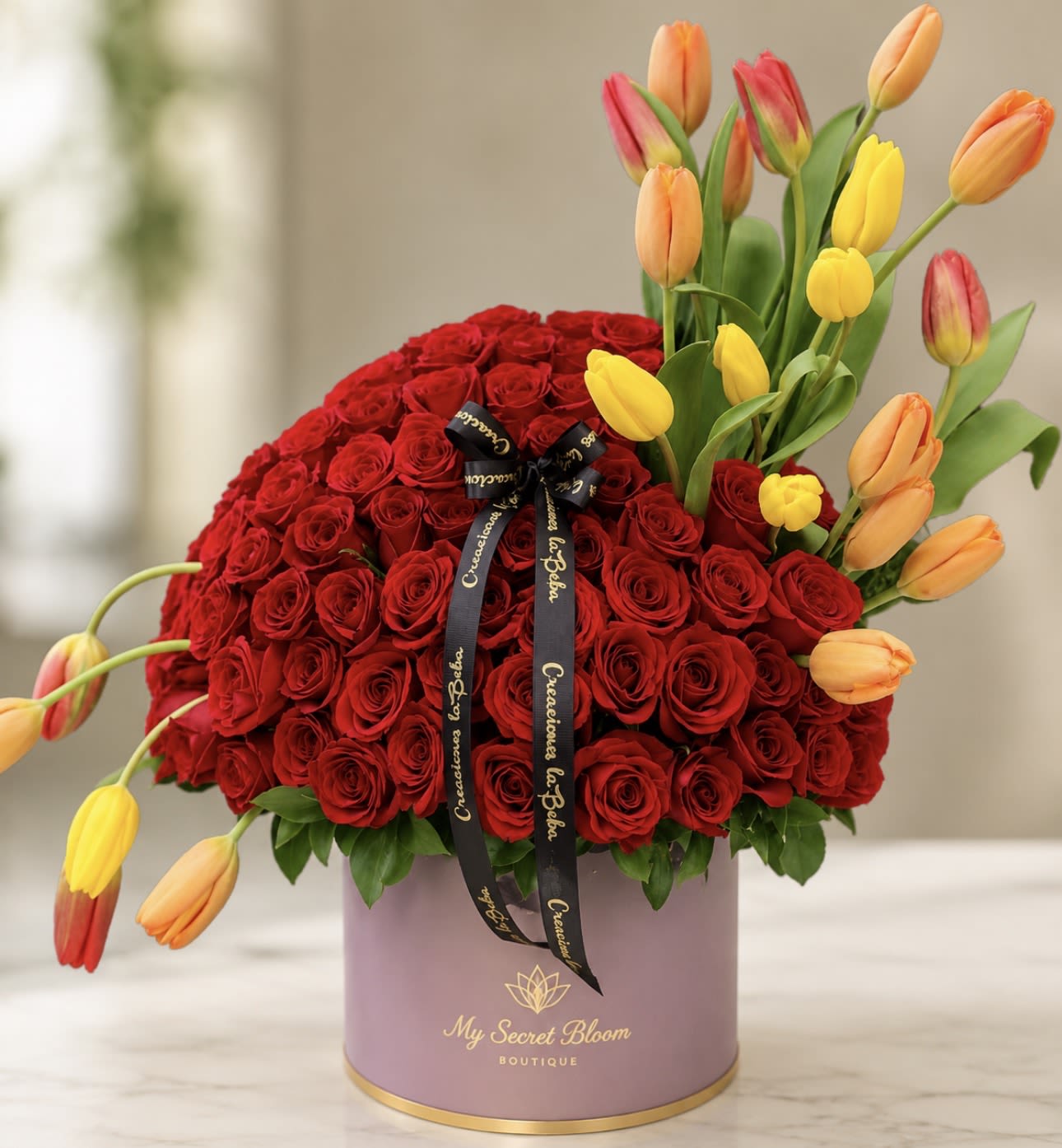 MYSTERIOUS CYLINDER - Every arrangement is handcrafted just for you. We carefully select the freshest flowers available each day. Occasionally, substitutions may be necessary due to seasonal or market availability, but we always replace them with flowers of equal or greater value in the same color palette and style. Your arrangement will always be beautiful, fresh, and thoughtfully designed.  