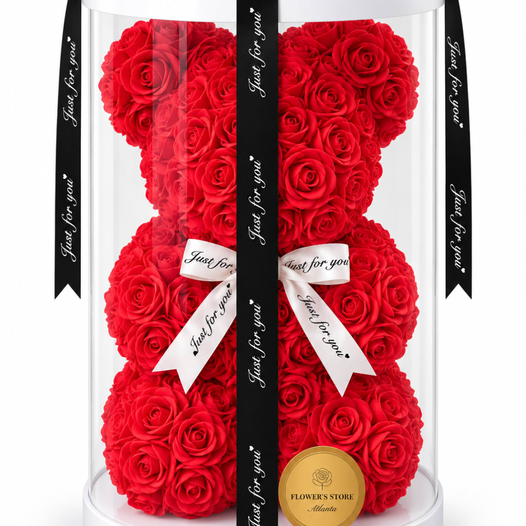 Red rose teddy bear in a clear display box with black and white ribbons
