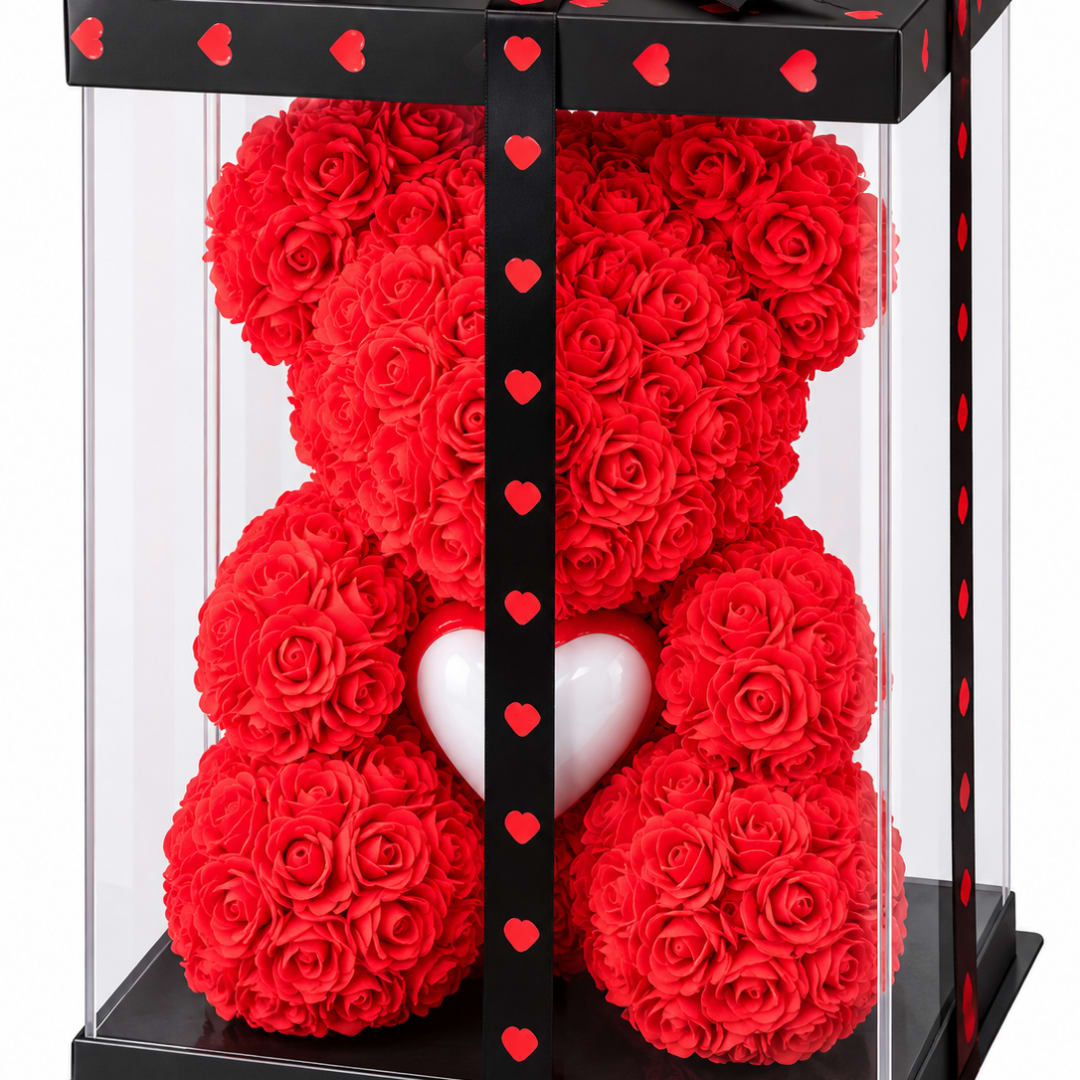 Red rose teddy bear in a clear display box with heart decorations