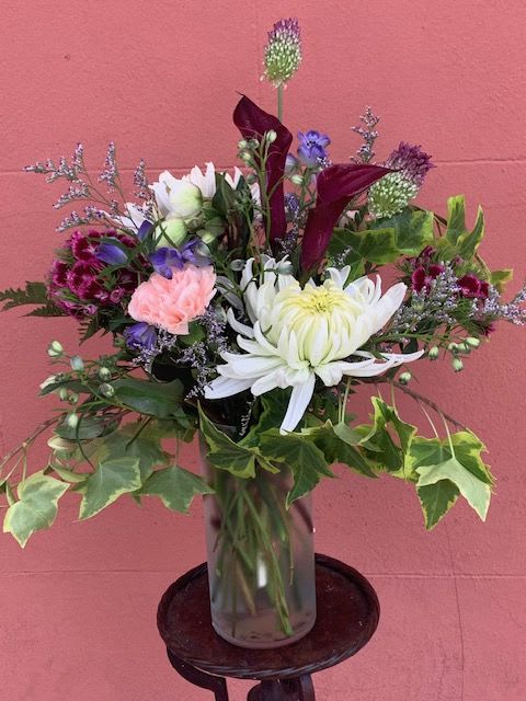 The Cheeky Mr. Moore - A wild gathering and cool blooms make up this whimsical vase design. Perfect for any occasion, man or woman.