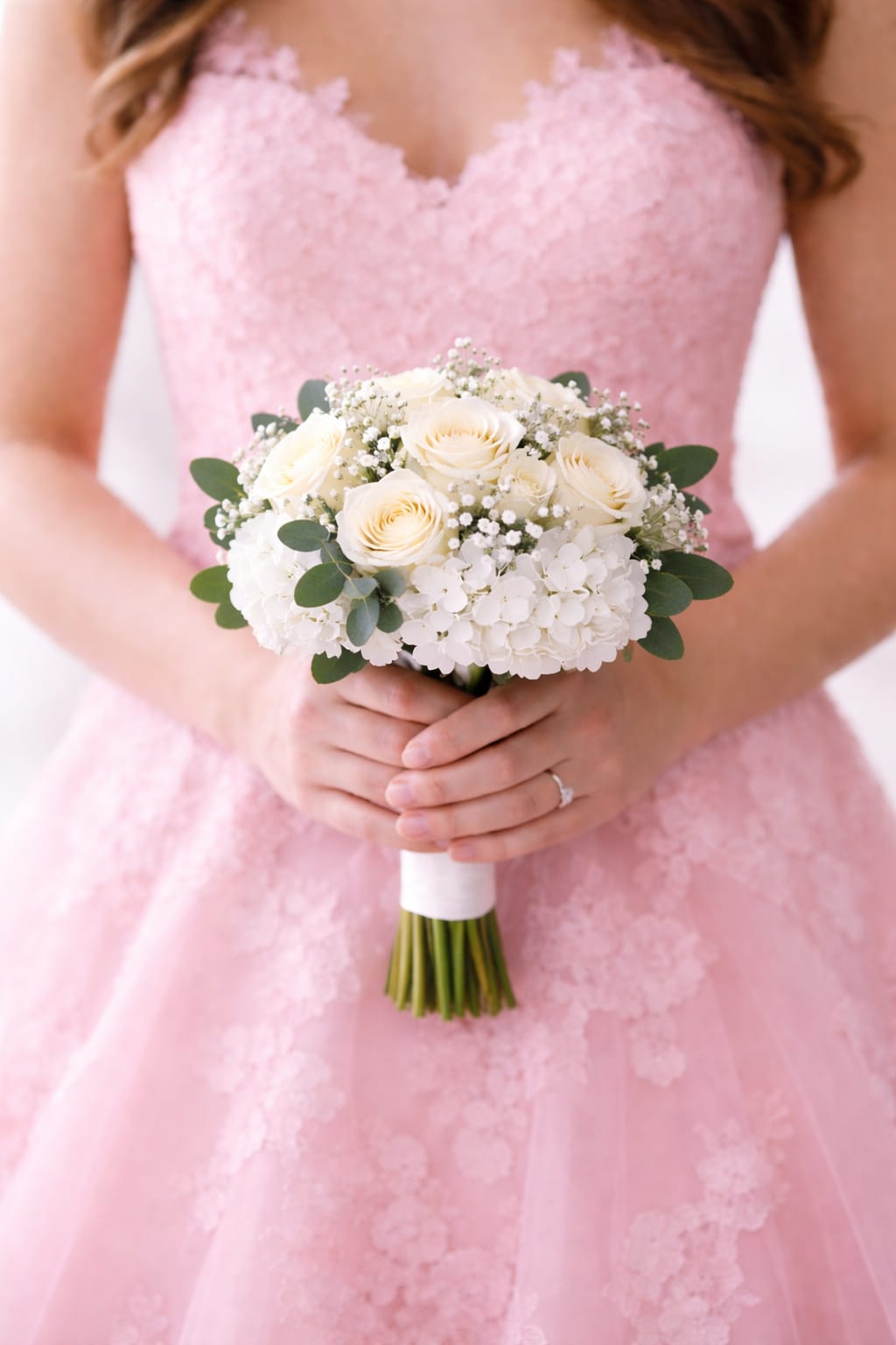 Handheld Bouquet - **Tell Us Your Color Preference In The Special Instructions**  (This is the size of a bridesmaids bouquet)  A versatile and elegant option for any occasion, our handheld bouquets are designed to add a refined, natural touch to your event. Each piece is thoughtfully arranged with a balanced mix of premium blooms, soft textures, and fresh greenery, creating a full, polished look that stands out beautifully in any setting.  Comfortable to hold and finished with clean, wrapped stems, these bouquets can be customized to match your style—whether you're going for something classic and timeless or modern and minimal. From intimate gatherings to larger celebrations, each bouquet is crafted with attention to detail to make a lasting impression.