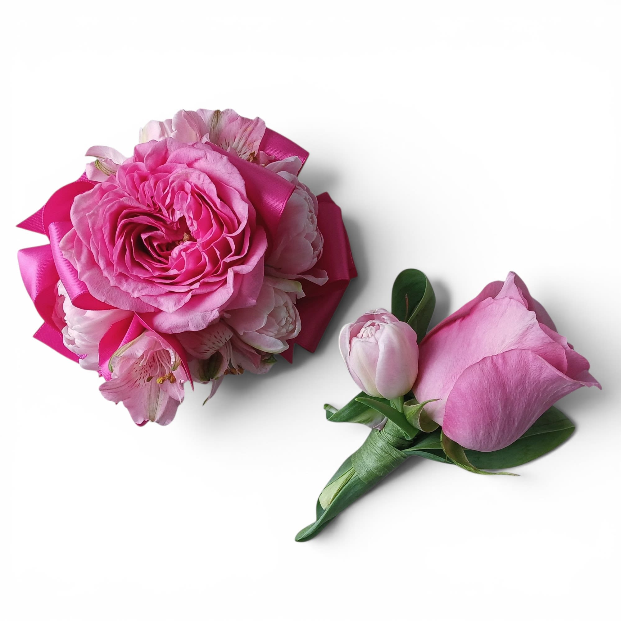 Prom Dance Corsage And Boutonniere - Please call for colors. Wrist corsage and matching boutonniere. Made extra special for their special dance.