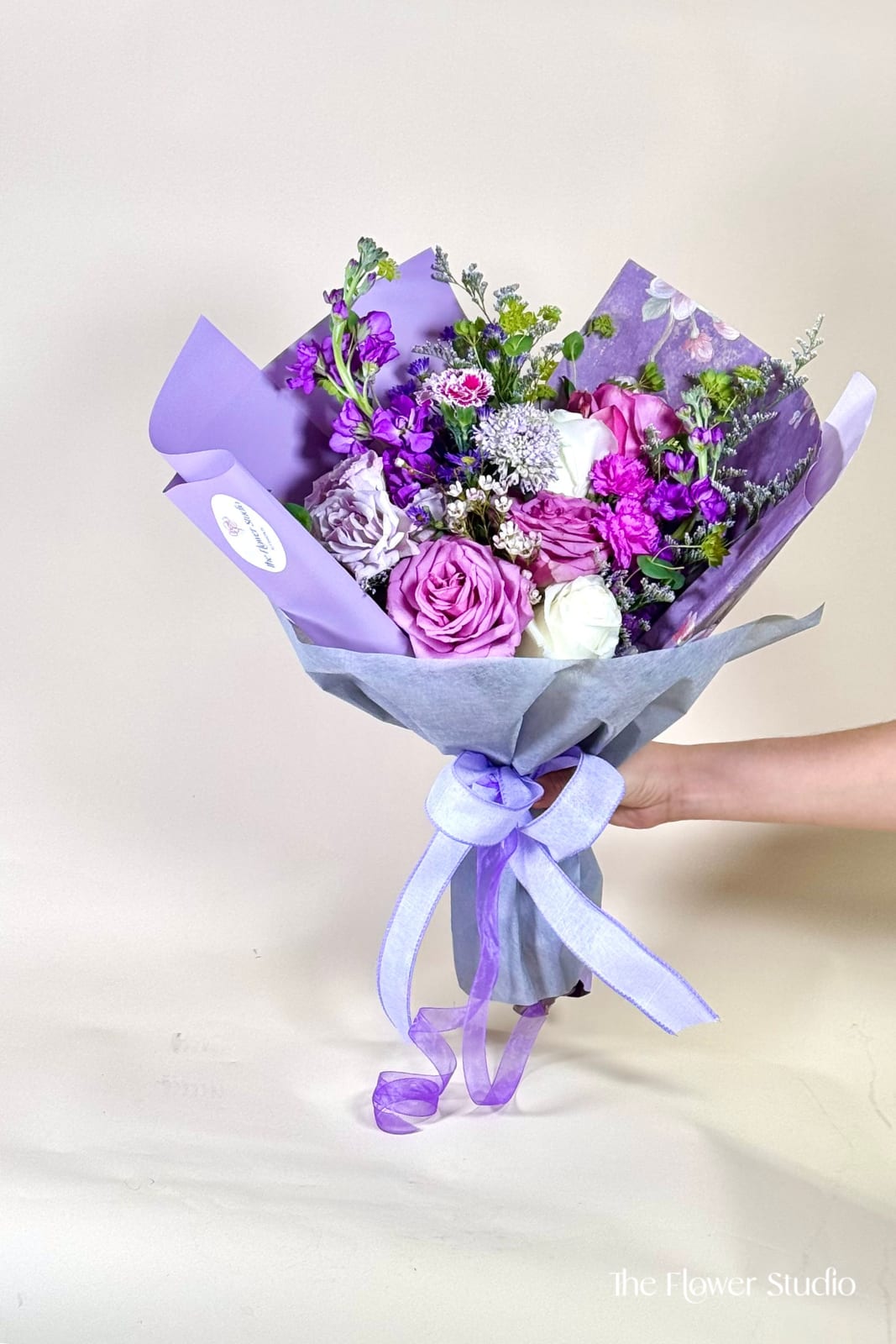 Crush in Bloom - A very full styled bouquet wrapped in deluxe paper to create a perfect gift for someone who wants something more different than a traditional vase!  Flowers and Colors may Vary. If you would like something specific please make note in the special instructions thank you!