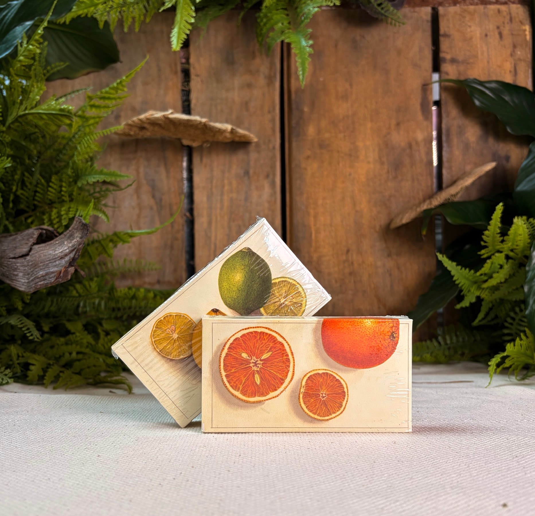 Citrus Matches - Observe nature's symmetry with juicy slices of orange, lemon and lime laying crisply, on a white matchbox. Vibrant orange tipped matches strike a sense of freshness, perhaps a smile. Perfect for hostess gifts, party or wedding favors and your candle! 50 sticks per box.