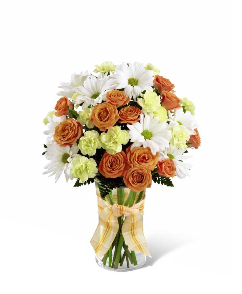  Sweet Splendor Bouquet -  Sweet Splendor Bouquet radiates cheer and well-wishes with every sun-filled bloom! Orange spray roses, yellow mini carnations, white traditional daisies and lush greens are brought together in a classic clear glass vase accented with a designer apricot plaid ribbon to create a bouquet set to brighten any day. GOOD bouquet includes 8 stems. Approx. 14âH x 10âW. BETTER bouquet includes 13 stems. Approx. 15âH x 11âW. BEST bouquet includes 19 stems. Approx. 16âH x 12âW.