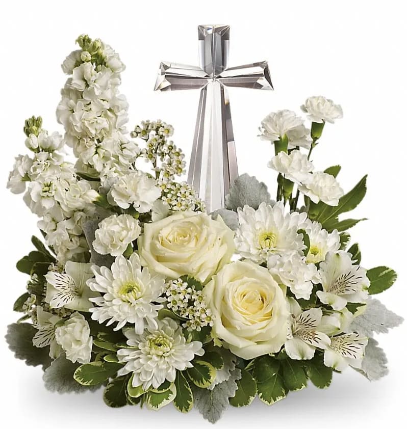 White rose and mum arrangement with a clear crystal cross in the center