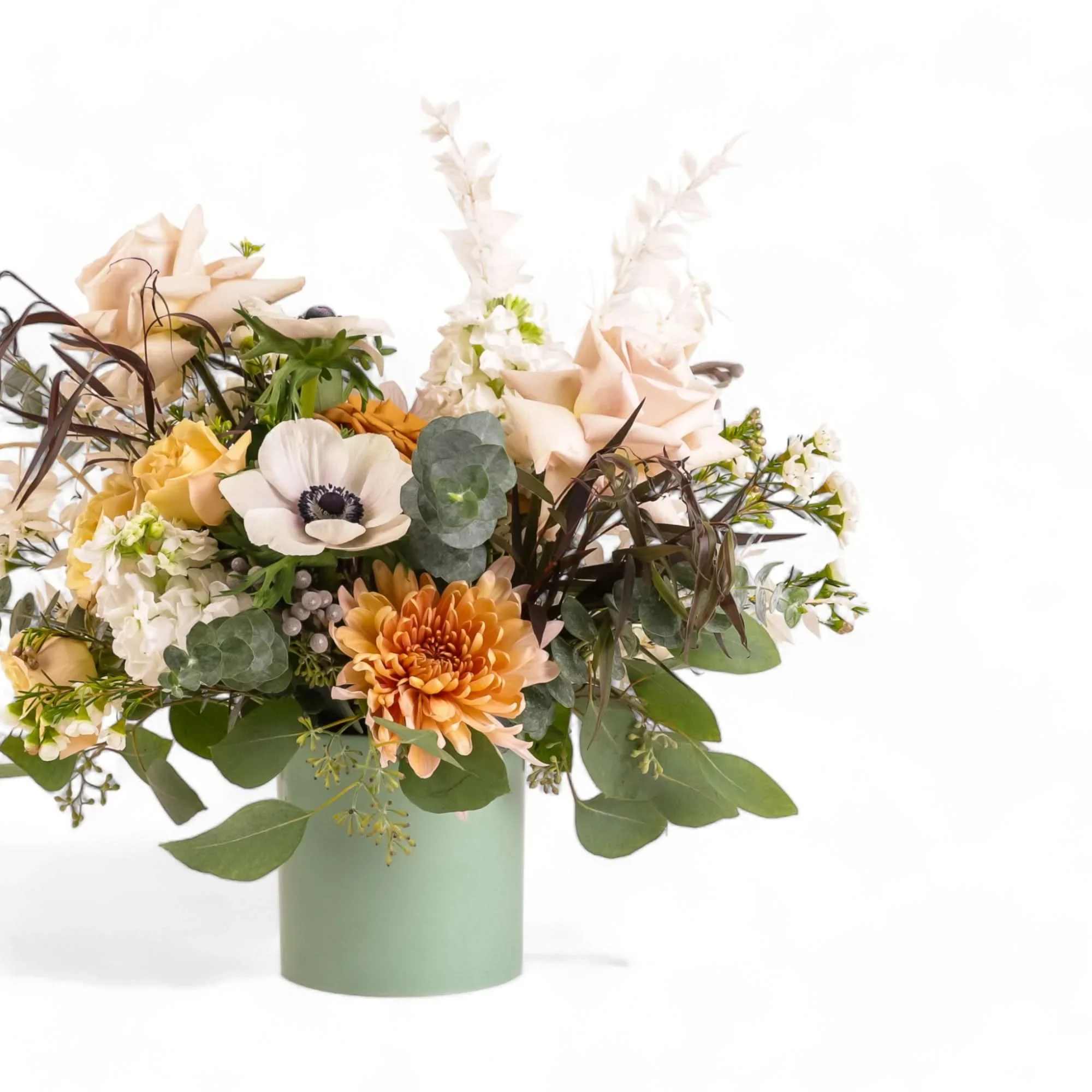 Autumn Harvest Centerpiece - Celebrate the beauty of autumn with our Autumn Harvest Table Arrangement, designed to bring modern elegance and seasonal warmth to your home. Every design is one of a kind and may include seasonal varieties such as dahlias, roses, chrysanthemums, gladiolus, and other fall blooms in warm, harmonious tones. Perfect as a centerpiece, fall table decoration, or thoughtful gift, this arrangement adds timeless charm to any space. Please note that the final arrangement may differ from the photos shown, as each piece is uniquely designed using the freshest blooms available. Your arrangement will feature a fall and modern theme tailored to the season and occasion. If you have a preferred color palette or specific floral varieties in mind, feel free to leave a note at checkout. We’ll do our best to accommodate your request based on seasonal availability. For essential requests, please contact our store directly to confirm availability before placing your order.