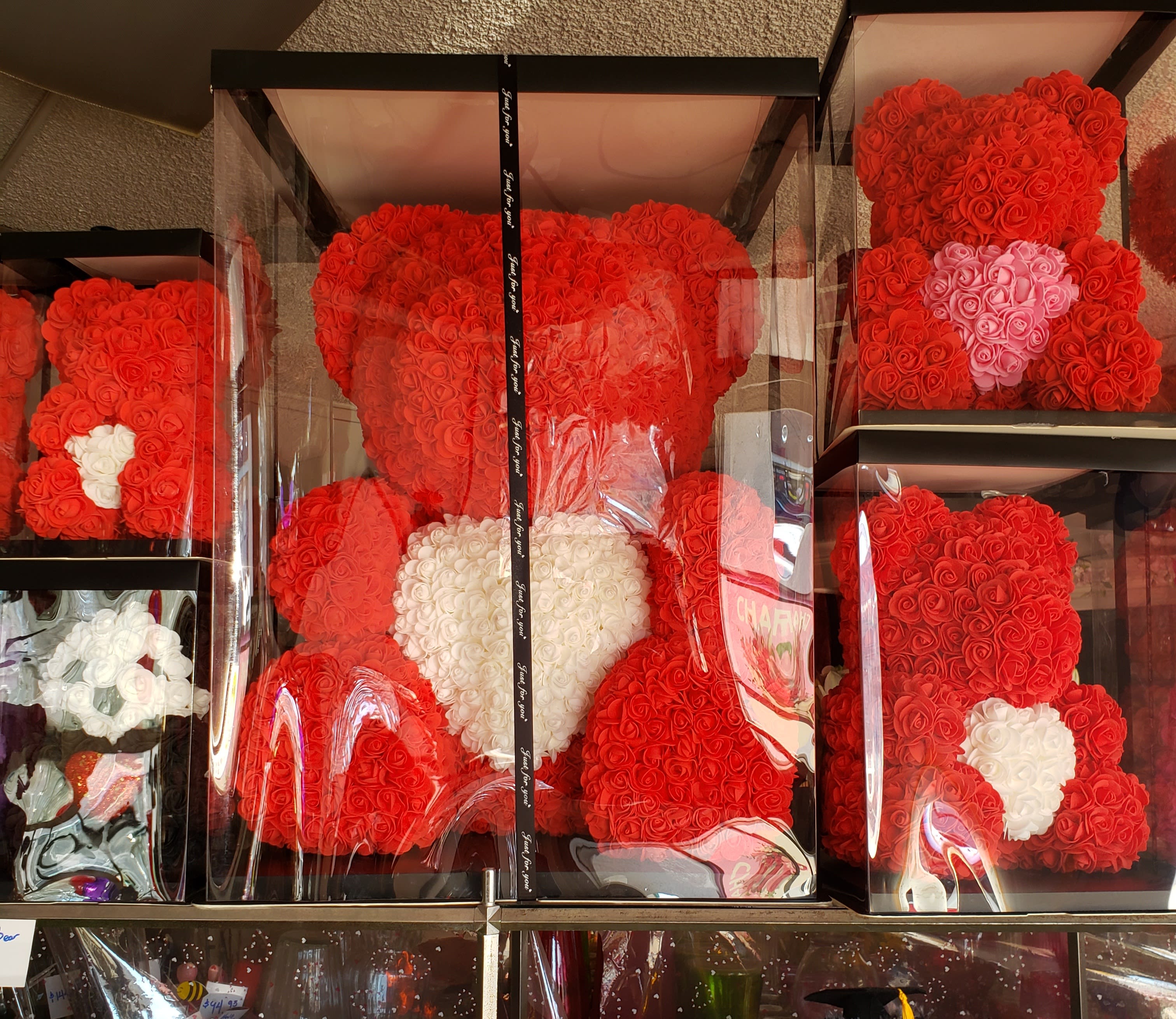 X-LARGE Rose Bear - A gorgeous teddy bear made of super soft artificial roses. LONG-LASTING: It will keep its attractive appearance and original color - it will make its owner happy for a long time  The roses are NOT real flowers they are 3D latex roses. That is absolutely safe and does not cause any allergies.   WE CARRY SEVERAL DIFFERENT COLORS. ( RED, PINK,WHITE AND PURPLE ) PLEASE SPECIFY COLOR CHOICE IN THE SPECIAL INSTRUCTION BOX.  (only the large bear included the heart in the middlle) Stated price is for one bear. Available colors are pictured. We will substitute color if not available. Some bears are two tone color and some has a heart while others are one solid color. X-Large  DIMENSION 21" X 26" 