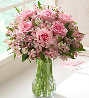 Peruvian lily and pink roses - Known as the Lily of the Incas, these Peruvian lovelies add an exotic touch to this hand-picked bouquet. Mixed with six stunning European long-stem pink roses, this majestic arrangement gives them the best of both worlds. Add on a vase for a timeless touch.