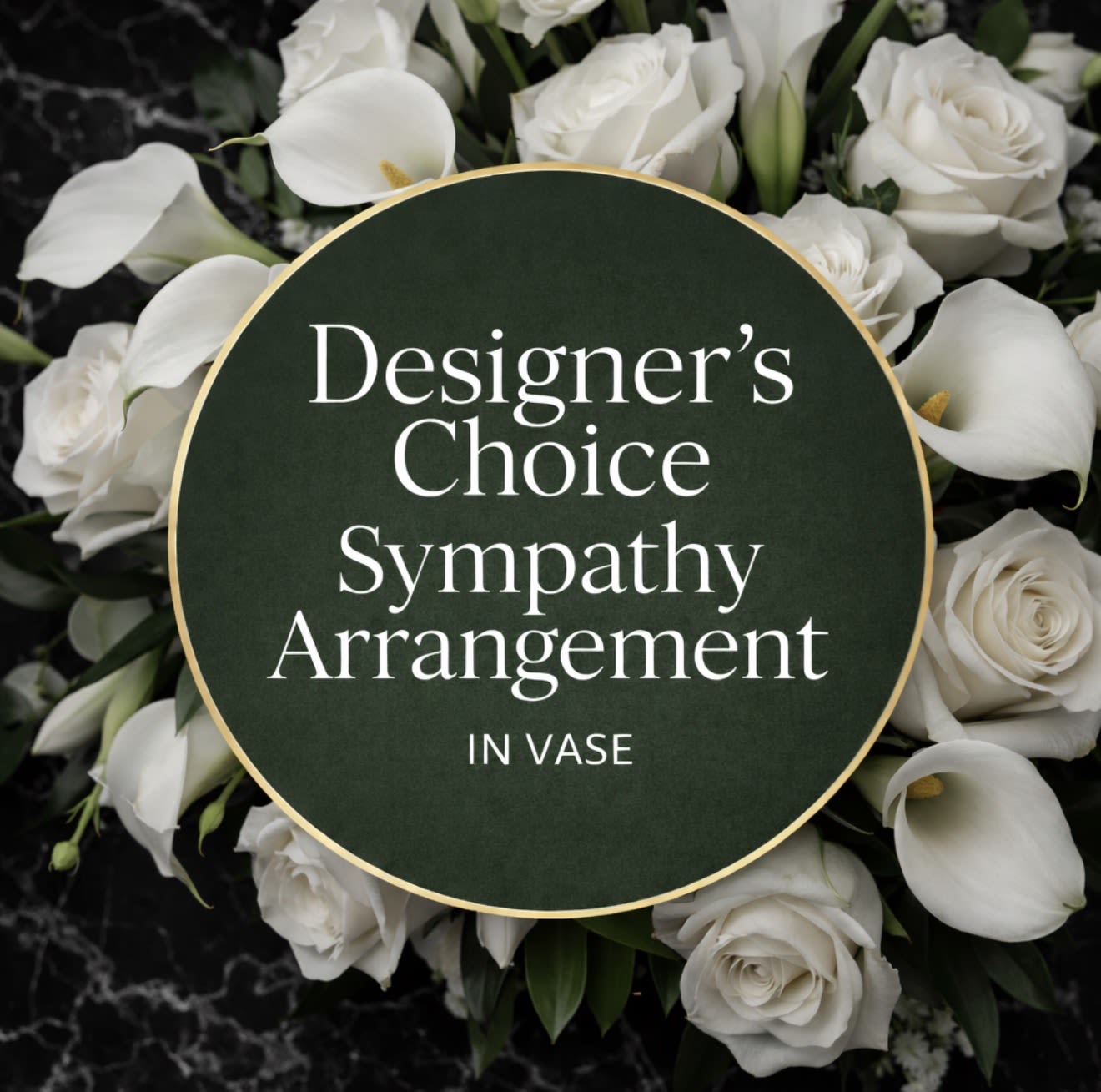 White roses and calla lilies arranged around a sympathy sign
