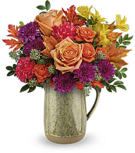 Teleflora's Harvest Joy Bouquet - Celebrate the essence of fall with this abundant bouquet of autumnal roses, artfully arranged in a rustic glazed ceramic pitcher.