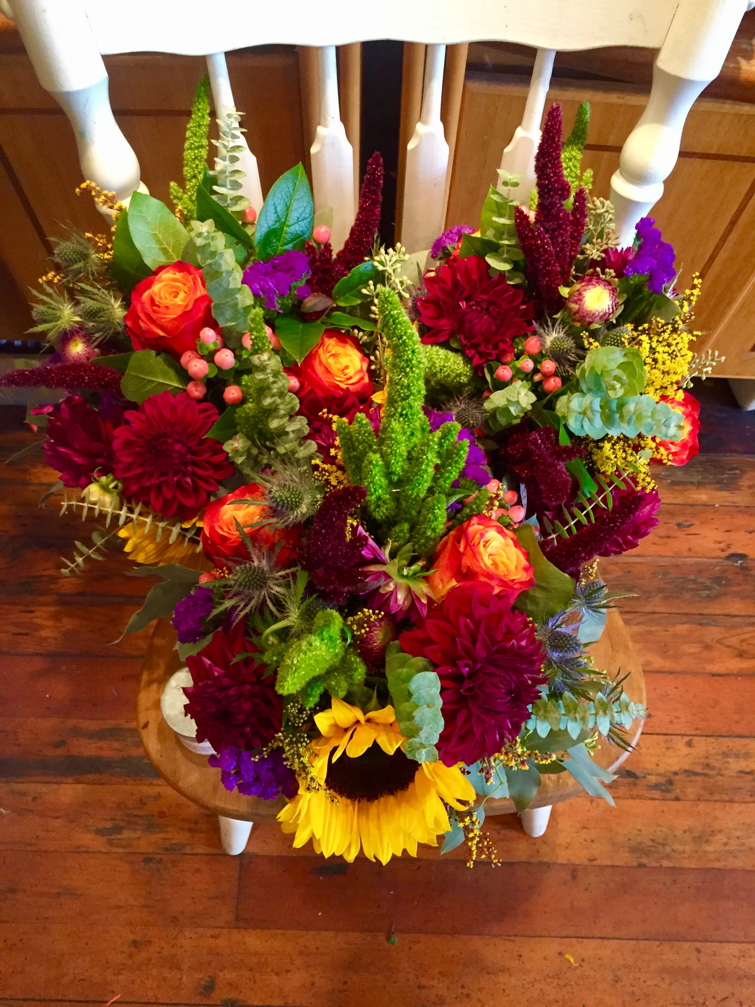 Autumn Sunset Trio - These fiery and textural, long-lasting arrangements are wonderful for your next dinner party or special event. Featuring orange roses, burgundy dahlias, and seasonal blooms and greenery. Each arrangement comes in a rustic mason jar. (Some flowers may be subject to change depending on the season. We will contact you with available flower substitutions; please contact us with specific questions if you are concerned with flower availability, thanks.) 3 x $100.00 each = $300.00 