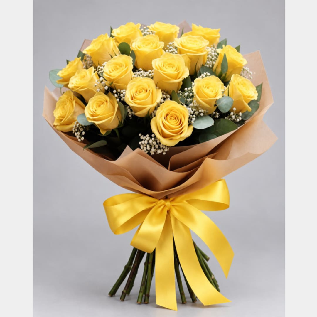 Bouquet of yellow roses wrapped in brown paper with a yellow ribbon