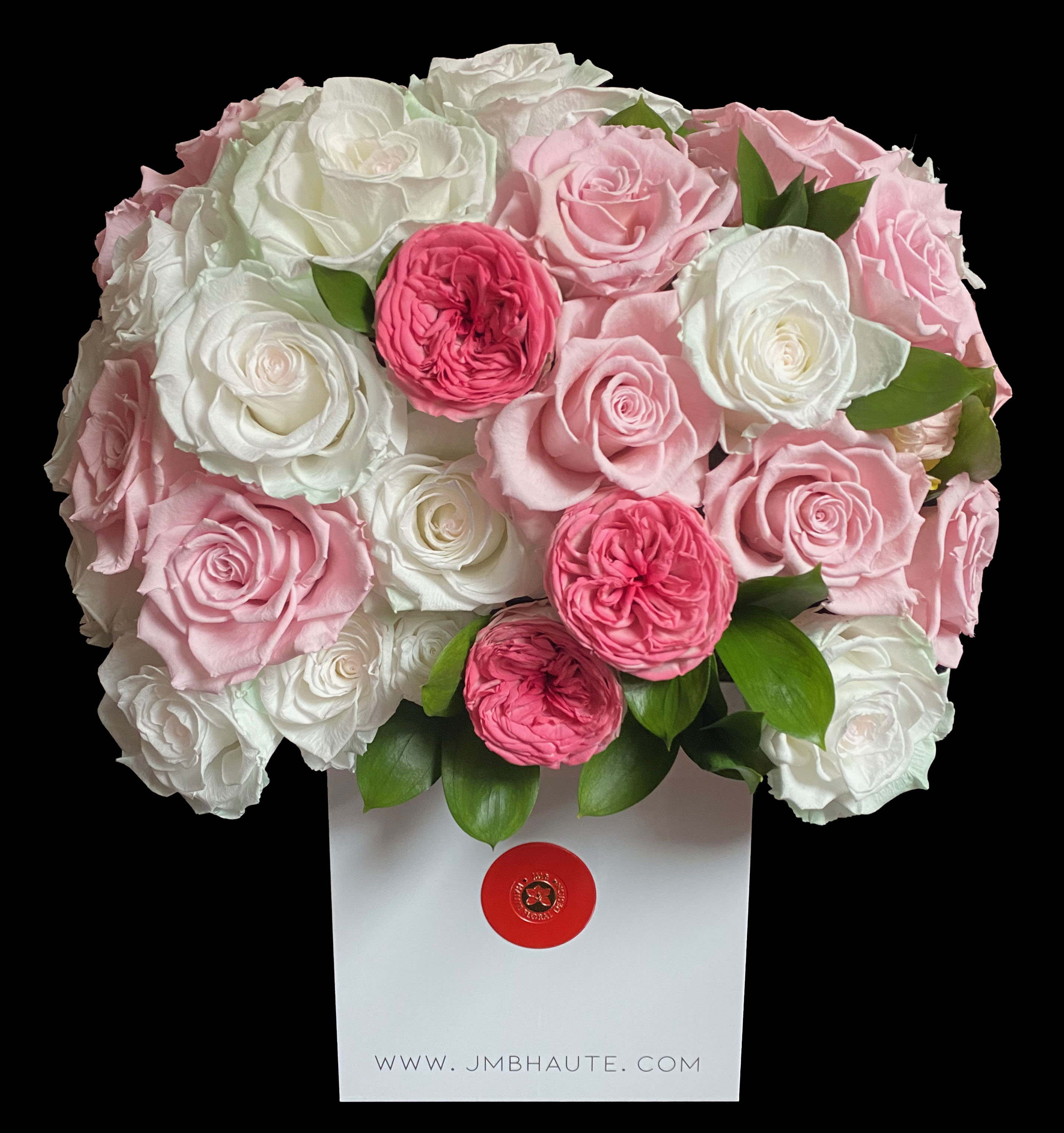 Pink and white rose bouquet in a white gift box